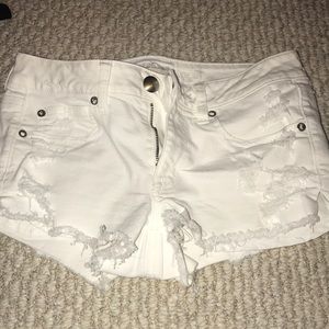 American Eagle white ripped denim shorts